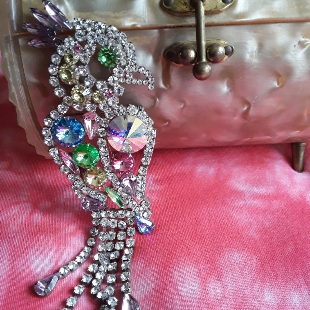 Vintage colored rhinstone parrot brooch.
